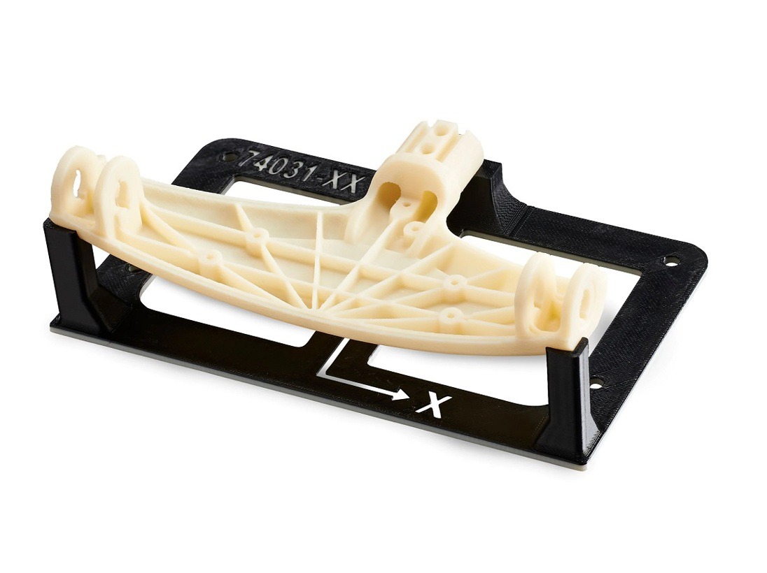 ABS-M30 anyaghoz bemutatott, Stratasys FDM technológiával készült gyártási készülék.